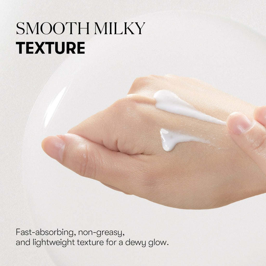 Hand applying smooth milky texture vt pdrn cream on a white background